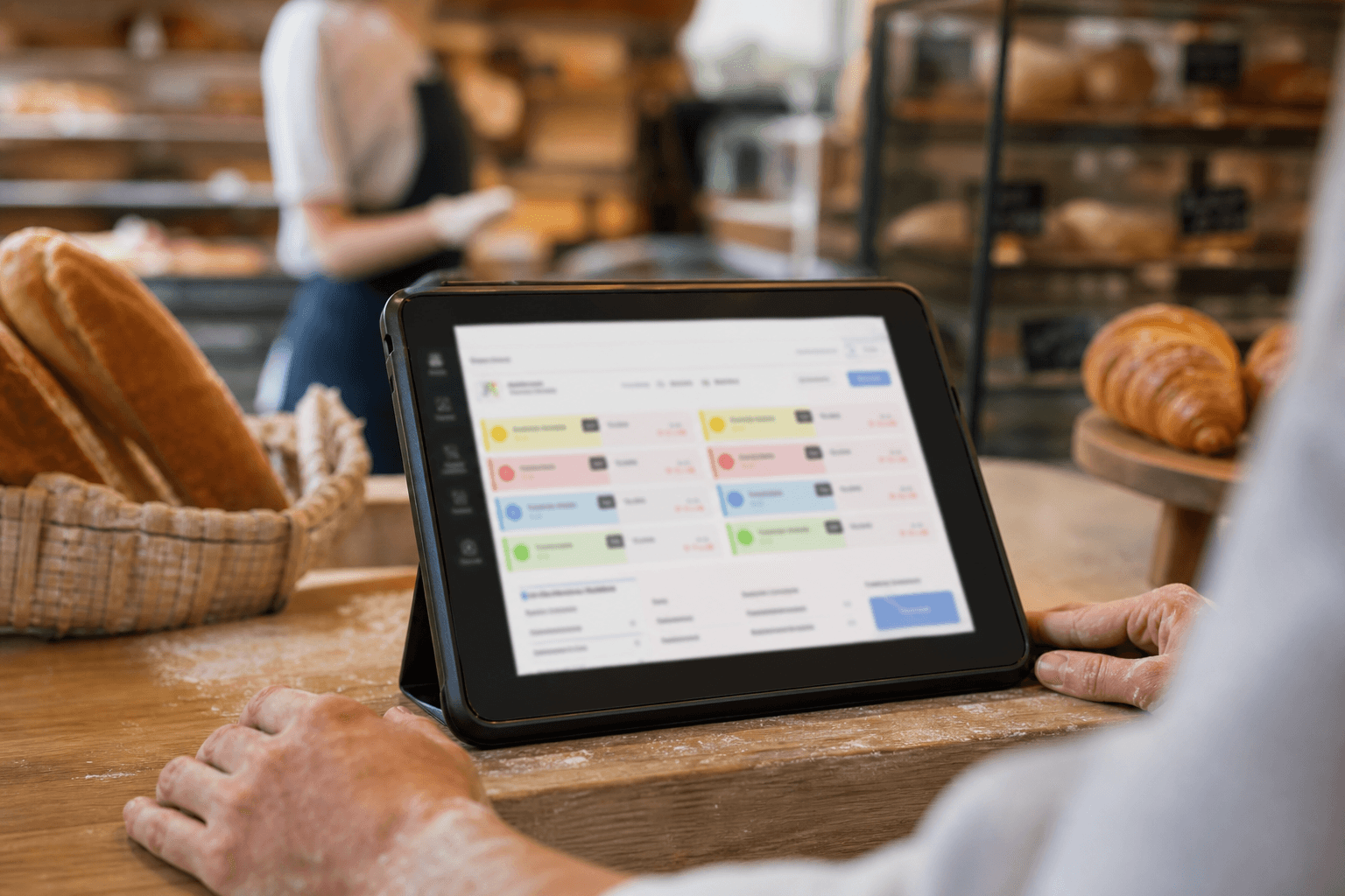 Bakery team planning custom cake orders with a calm, organized workspace